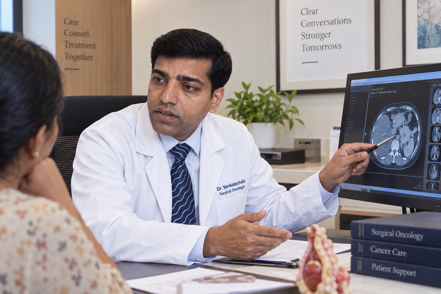 Dr. Venkatachala K clearing a patient's doubts using scan images